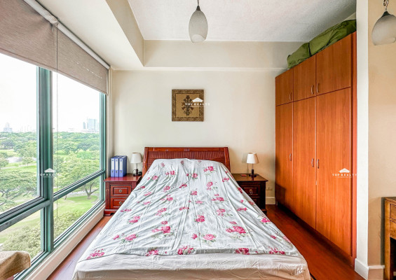 A semi-furnished condo unit with a breathtaking Manila Golf Course view