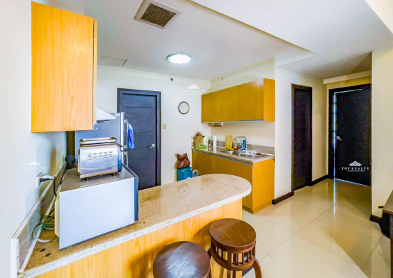 This semi-furnished condo comes with a spacious balcony