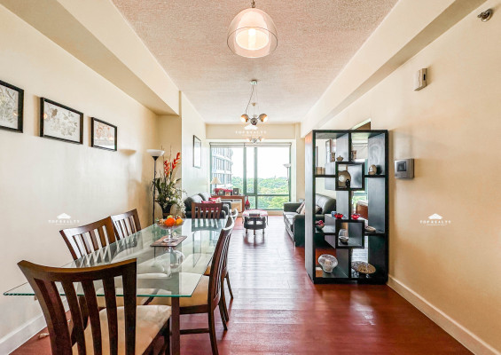 A semi-furnished condo unit with a breathtaking Manila Golf Course view