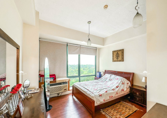 A semi-furnished condo unit with a breathtaking Manila Golf Course view