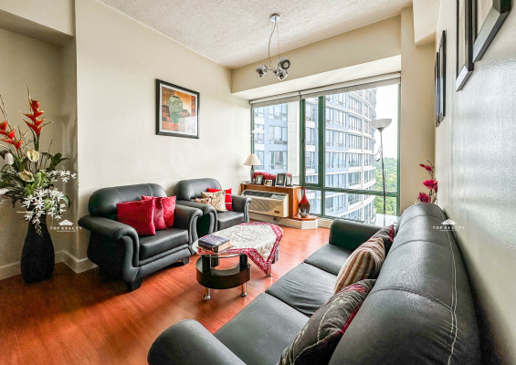 A semi-furnished condo unit with a breathtaking Manila Golf Course view