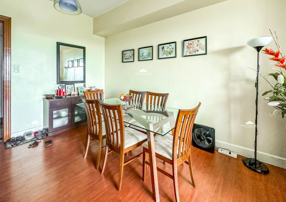 A semi-furnished condo unit with a breathtaking Manila Golf Course view