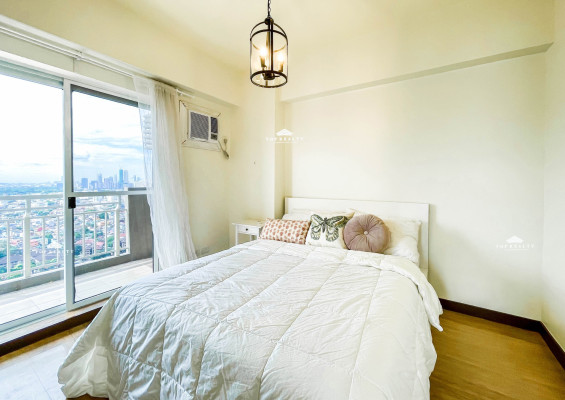 Elevate your lifestyle with this fully-furnished corner condo unit
