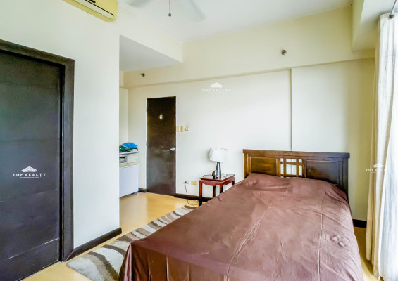 This semi-furnished condo comes with a spacious balcony