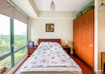 A semi-furnished condo unit with a breathtaking Manila Golf Course view