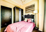 brand new, fully-furnished condominium in McKinley