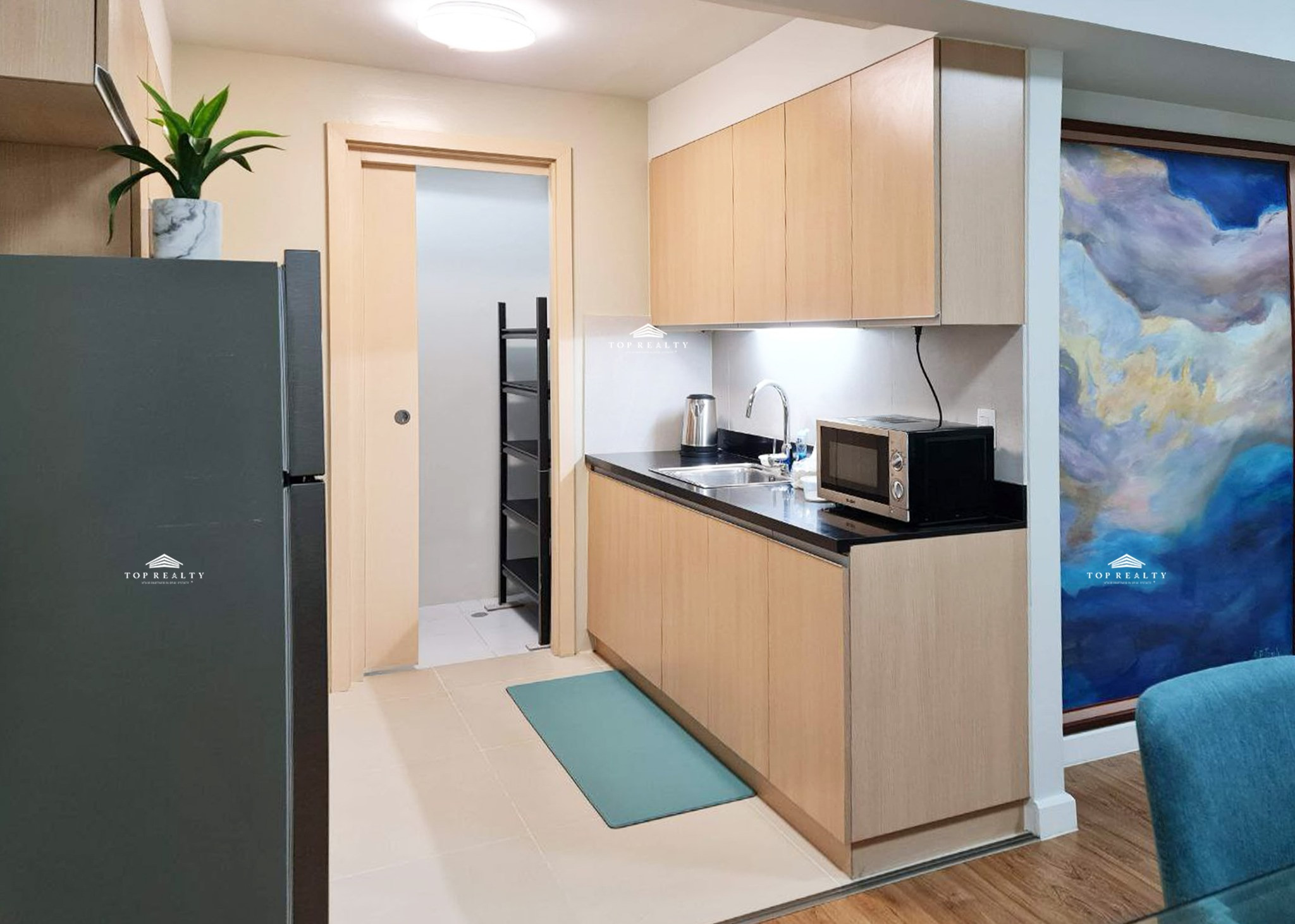 1BR Condo Unit with Homey Interiors for Sale in The Sandstone at Portico photo 5