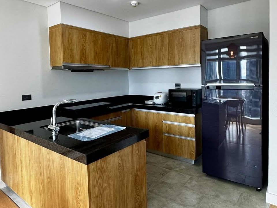 Fully-furnished 2-bedroom condo with balcony and parking for sale photo 4