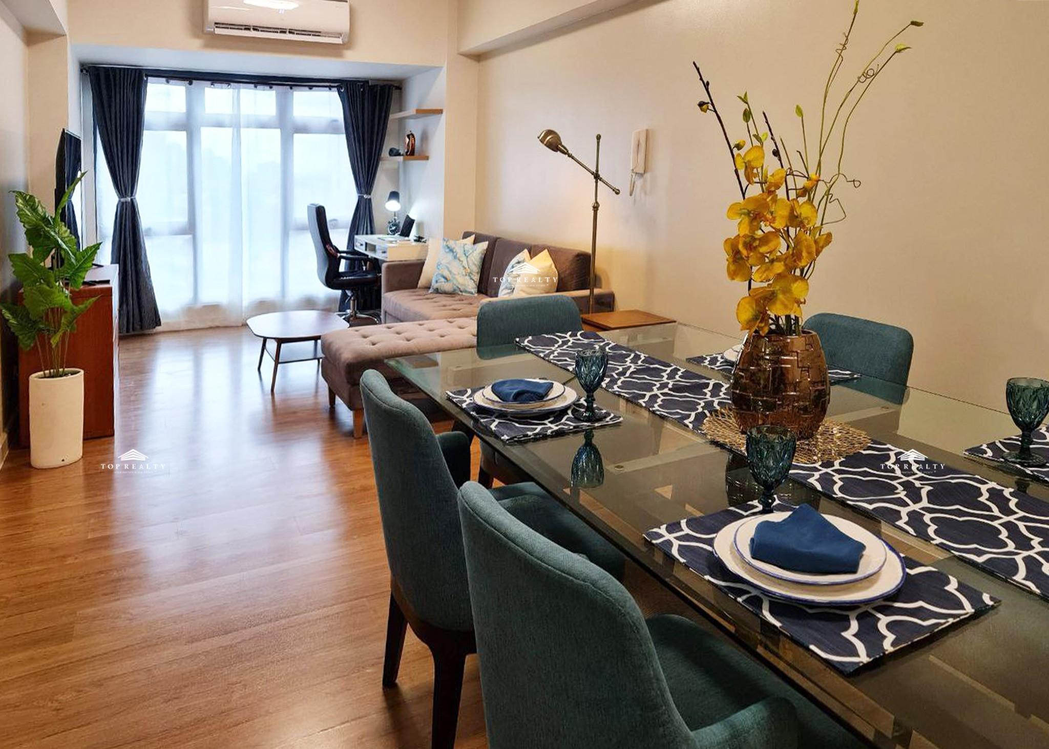 1BR Condo Unit with Homey Interiors for Sale in The Sandstone at Portico photo 1