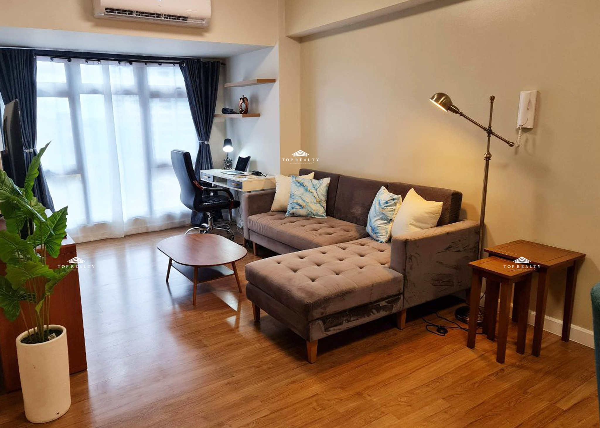 1BR Condo Unit with Homey Interiors for Sale in The Sandstone at Portico photo 2