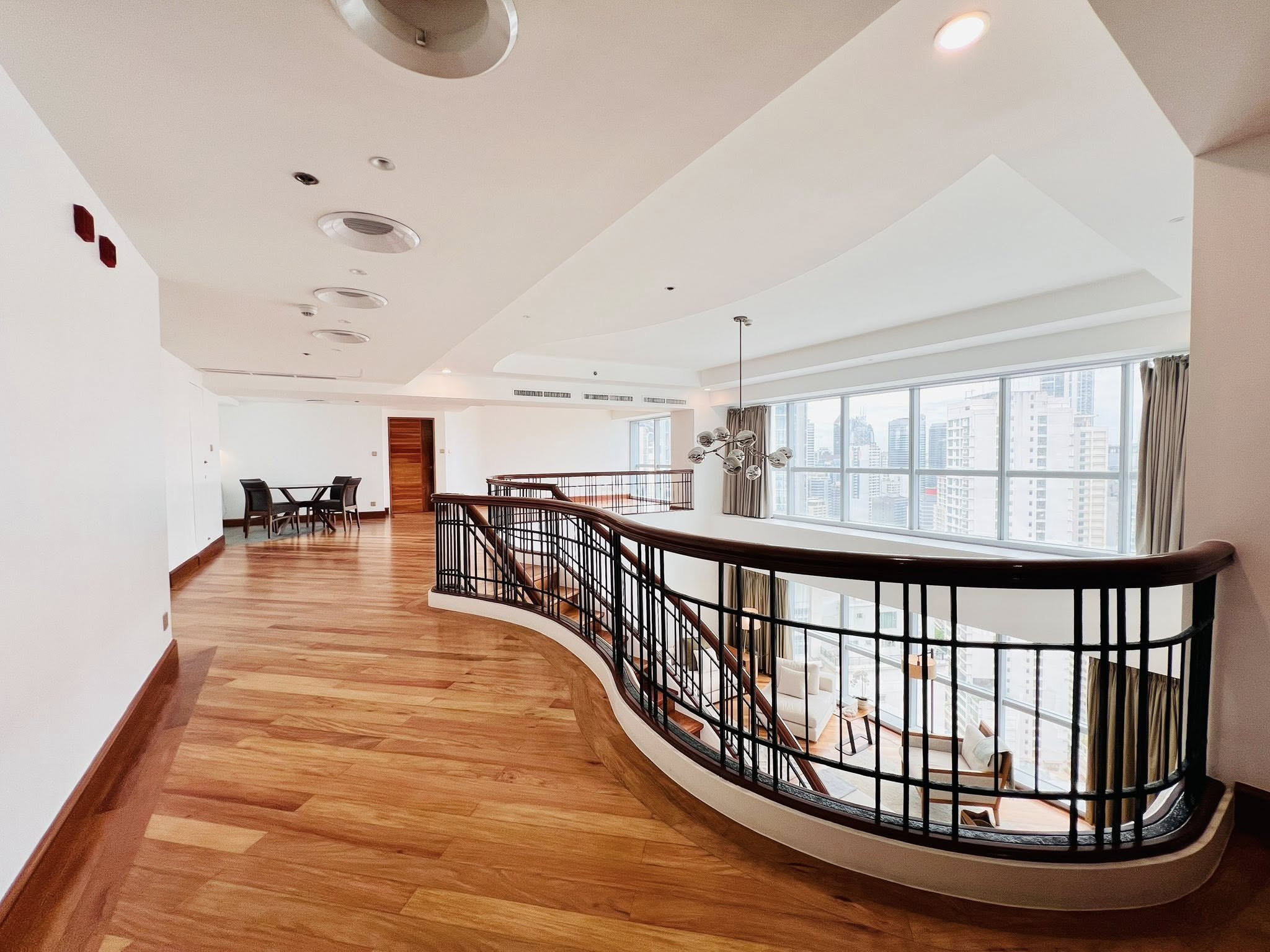 Walk-Through this 4-Bedroom Penthouse Bi-Level Unit in The Forbes Tower photo 4